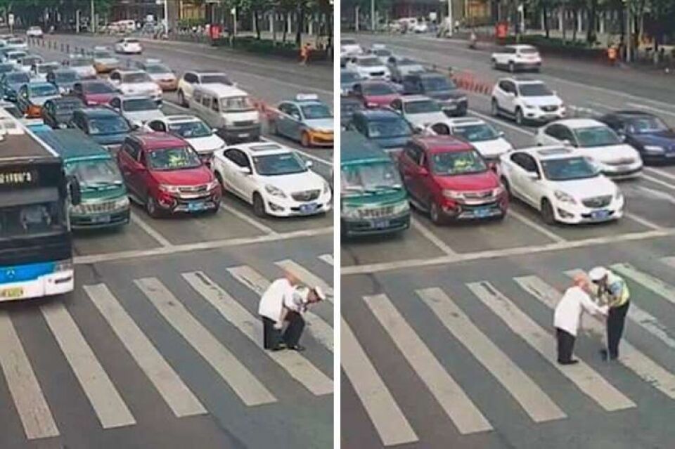 Policial emociona web ao carregar idoso nas costas em cruzamento